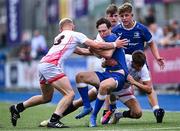 16 August 2023; Derry Moloney of Leinster in action against Fraser Cunningham, left, and Frank Davis of Ulster during the U18 Schools Interprovincial Championship match between Leinster and Ulster at Energia Park in Dublin. Photo by Piaras Ó Mídheach/Sportsfile