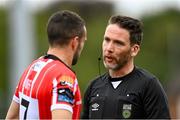 13 August 2023; Referee Eoghan O'Shea speaks with Michael Duffy of Derry City during the SSE Airtricity Men's Premier Division match between Derry City and Drogheda United at The Ryan McBride Brandywell Stadium in Derry. Photo by Stephen McCarthy/Sportsfile