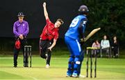 17 August 2023; Byron McDonaugh of Munster Reds delivers to Seamus Lynch of Leinster Lightning during the Rario Inter-Provincial Cup match between Munster Reds and Leinster Lightning at The Mardyke in Cork. Photo by Eóin Noonan/Sportsfile