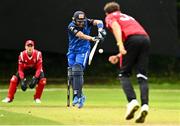 17 August 2023; Liam McCarthy of Munster Reds delivers to Simi Singh of Leinster Lightning during the Rario Inter-Provincial Cup match between Munster Reds and Leinster Lightning at The Mardyke in Cork. Photo by Eóin Noonan/Sportsfile