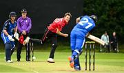 17 August 2023; Byron McDonaugh of Munster Reds delivers to Simi Singh of Leinster Lightning during the Rario Inter-Provincial Cup match between Munster Reds and Leinster Lightning at The Mardyke in Cork. Photo by Eóin Noonan/Sportsfile