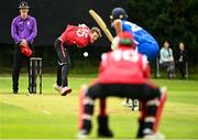 17 August 2023; Byron McDonaugh of Munster Reds delivers to David Delaney of Leinster Lightning during the Rario Inter-Provincial Cup match between Munster Reds and Leinster Lightning at The Mardyke in Cork. Photo by Eóin Noonan/Sportsfile