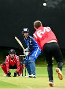 17 August 2023; Gareth Delaney of Munster Reds delivers to Gavin Hoey of Leinster Lightning during the Rario Inter-Provincial Cup match between Munster Reds and Leinster Lightning at The Mardyke in Cork. Photo by Eóin Noonan/Sportsfile