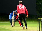 17 August 2023; Gareth Delaney of Munster Reds delivers to David Delaney of Leinster Lightning during the Rario Inter-Provincial Cup match between Munster Reds and Leinster Lightning at The Mardyke in Cork. Photo by Eóin Noonan/Sportsfile