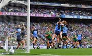 13 August 2023; Louise Ní Mhuircheartaigh of Kerry scores her side's first goal, under pressure from Dublin's Niamh Donlon, left, and Leah Caffrey, 3, during the 2023 TG4 LGFA All-Ireland Senior Championship Final match between Dublin and Kerry at Croke Park in Dublin. Photo by Seb Daly/Sportsfile