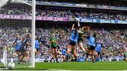 13 August 2023; Louise Ní Mhuircheartaigh of Kerry scores her side's first goal, under pressure from Dublin's Niamh Donlon, left, and Leah Caffrey, 3, during the 2023 TG4 LGFA All-Ireland Senior Championship Final match between Dublin and Kerry at Croke Park in Dublin. Photo by Seb Daly/Sportsfile