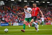 17 August 2023; Ivan Rogac of Tobol tackles Michael Duffy of Derry City, resulting in a penalty, during the UEFA Europa Conference League Third Qualifying Round second leg match between Derry City and FC Tobol at Tallaght Stadium in Dublin. Photo by Ben McShane/Sportsfile