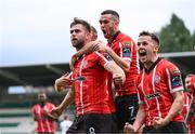 17 August 2023; Will Patching of Derry City celebrates after scoring his side's first goal, a penalty, with team-mate Ben Doherty, right, and Michael Duffy, 7, during the UEFA Europa Conference League Third Qualifying Round second leg match between Derry City and FC Tobol at Tallaght Stadium in Dublin. Photo by Stephen McCarthy/Sportsfile