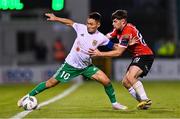 17 August 2023; Serikzhan Muzhikov of Tobol in action against Adam O'Reilly of Derry City during the UEFA Europa Conference League Third Qualifying Round second leg match between Derry City and FC Tobol at Tallaght Stadium in Dublin. Photo by Ben McShane/Sportsfile