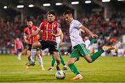 17 August 2023; Roman Asrankulov of Tobol in action against Adam O'Reilly of Derry City during the UEFA Europa Conference League Third Qualifying Round second leg match between Derry City and FC Tobol at Tallaght Stadium in Dublin. Photo by Ben McShane/Sportsfile