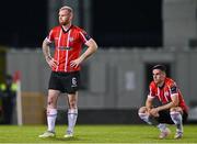 17 August 2023; Mark Connolly, left, and Jordan McEneff of Derry City react after losing the penalty shootout after the UEFA Europa Conference League Third Qualifying Round second leg match between Derry City and FC Tobol at Tallaght Stadium in Dublin. Photo by Ben McShane/Sportsfile