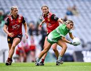 13 August 2023; Deborah Murphy of Limerick in action against Meghan Doherty, left, and Aoife Laverty of Down during the 2023 TG4 All-Ireland Ladies Junior Football Championship Final match between Down and Limerick at Croke Park in Dublin. Photo by Piaras Ó Mídheach/Sportsfile