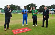 18 August 2023; Team captains Paul Stirling of Ireland, right, and Jasprit Bumrah of India, with match referee Graham McCrea, right, and presenter Niall O'Brien, at the coin toss before match one of the Men's T20 International series between Ireland and India at Malahide Cricket Ground in Dublin. Photo by Seb Daly/Sportsfile