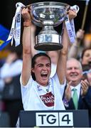 13 August 2023; Kildare captain Grace Clifford lifts the Mary Quinn Memorial Cup after her side's victory in the 2023 TG4 All-Ireland Ladies Intermediate Football Championship Final match between Clare and Kildare at Croke Park in Dublin. Photo by Piaras Ó Mídheach/Sportsfile
