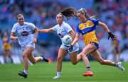 13 August 2023; Fidelma Marrinan of Clare in action against Laoise Lenehan and Ruth Sargent, left, of Kildare during the 2023 TG4 All-Ireland Ladies Intermediate Football Championship Final match between Clare and Kildare at Croke Park in Dublin. Photo by Piaras Ó Mídheach/Sportsfile