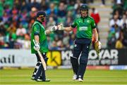 18 August 2023; Ireland batters Paul Stirling, left, and Harry Tector during match one of the Men's T20 International series between Ireland and India at Malahide Cricket Ground in Dublin. Photo by Seb Daly/Sportsfile