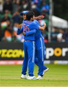 18 August 2023; Ravi Bishnoi of India, left, is congratulated by teammate Yashasvi Jaiswal after claiming the wicket of Ireland's Paul Stirling during match one of the Men's T20 International series between Ireland and India at Malahide Cricket Ground in Dublin. Photo by Seb Daly/Sportsfile