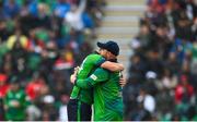 18 August 2023; Paul Stirling of Ireland, right, is congratulated by teammate Craig Young after claiming the wicket of India's Yashasvi Jaiswal during match one of the Men's T20 International series between Ireland and India at Malahide Cricket Ground in Dublin. Photo by Seb Daly/Sportsfile