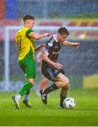 18 August 2023; James McManus of Bohemians in action against Ian Mylod of Rockmount AFC during the Sports Direct Men’s FAI Cup Second Round match between Bohemians and Rockmount at Dalymount Park in Dublin. Photo by Tyler Miller/Sportsfile