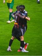 18 August 2023; Jonathan Afolabi of Bohemians, right, celebrates with teammate Bartlomiej Kukulowicz after scoring their side's second goal  during the Sports Direct Men’s FAI Cup Second Round match between Bohemians and Rockmount at Dalymount Park in Dublin. Photo by Tyler Miller/Sportsfile