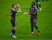 18 August 2023; Jonathan Afolabi of Bohemians, right, celebrates with teammate Bartlomiej Kukulowicz after scoring their side's second goal  during the Sports Direct Men’s FAI Cup Second Round match between Bohemians and Rockmount at Dalymount Park in Dublin. Photo by Tyler Miller/Sportsfile