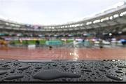 19 August 2023; Rain falls on the track which led to a delay in the start of the morning session on day one of the World Athletics Championships at the National Athletics Centre in Budapest, Hungary. Photo by Sam Barnes/Sportsfile