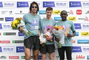 19 August 2023; Winner David Glynn, centre, with second placed Mick Clohisey of Raheny Shamrock AC, Dublin, left, and third-placed Peter Somba of Dunboyne AC in Meath after the Irish Life Race Series– Frank Duffy 10 Mile at Phoenix Park in Dublin. Photo by Piaras Ó Mídheach/Sportsfile