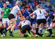 19 August 2023; Aoife Moore of Leinster is tackled by Ulster players, from left, Keelin Brady, Maebh Clenaghan and Gemma McCamley during the Vodafone Women’s Interprovincial Championship match between Leinster and Ulster at Energia Park in Dublin. Photo by Ben McShane/Sportsfile