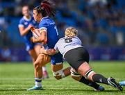 19 August 2023; Natasja Behan of Leinster is tackled by Taryn Schutzler of Ulster during the Vodafone Women’s Interprovincial Championship match between Leinster and Ulster at Energia Park in Dublin. Photo by Ben McShane/Sportsfile