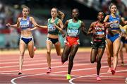 19 August 2023; Sarah Healy of Ireland, second from left, crosses the finish line to finish third in her heat in the women's 1500m during day one of the World Athletics Championships at the National Athletics Centre in Budapest, Hungary. Photo by Sam Barnes/Sportsfile