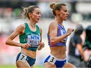 19 August 2023; Sarah Healy of Ireland, left, competes in the women's 1500m during day one of the World Athletics Championships at the National Athletics Centre in Budapest, Hungary. Photo by Sam Barnes/Sportsfile
