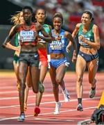 19 August 2023; Sophie O'Sullivan of Ireland, right, competes in the women's 1500m during day one of the World Athletics Championships at the National Athletics Centre in Budapest, Hungary. Photo by Sam Barnes/Sportsfile