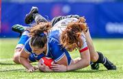 19 August 2023; Katie Whelan of Leinster scores her side's fifth try despite the tackle of Ella Durkan of Ulster during the Vodafone Women’s Interprovincial Championship match between Leinster and Ulster at Energia Park in Dublin. Photo by Ben McShane/Sportsfile