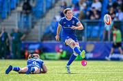 19 August 2023; Hannah O'Connor of Leinster kicks a conversion, with the assistance of try-scorer Katie Whelan, during the Vodafone Women’s Interprovincial Championship match between Leinster and Ulster at Energia Park in Dublin. Photo by Ben McShane/Sportsfile
