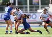 19 August 2023; Caitlin Crowe of Ulster is tackled by Leinster players Meabh O'Hara, left, and Sadhbh Furlong during the Girl’s Interprovincial Championship match between Leinster and Ulster at Energia Park in Dublin. Photo by John Sheridan/Sportsfile