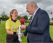 19 August 2023; FAI President Gerry McAnaney presents Referee Sarah Dyas with a medal after the FAI Women’s Amateur Shield Final 2023 match between St Patrick’s CYFC and Wilton United at Newhill Park in Two Mile Borris, Tipperary. Photo by Tom Beary/Sportsfile