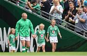 19 August 2023; Keith Earls of Ireland walks out with his daughters Ella-May, Laurie and Emie before earning his 100th cap in the Bank of Ireland Nations Series match between Ireland and England at the Aviva Stadium in Dublin. Photo by Harry Murphy/Sportsfile