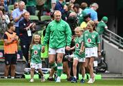 19 August 2023; Keith Earls of Ireland walks out with his daughters Ella-May, Laurie and Emie before earning his 100th cap in the Bank of Ireland Nations Series match between Ireland and England at the Aviva Stadium in Dublin. Photo by Harry Murphy/Sportsfile