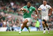 19 August 2023; Bundee Aki of Ireland on his way to scoring his side's first try during the Bank of Ireland Nations Series match between Ireland and England at the Aviva Stadium in Dublin. Photo by Harry Murphy/Sportsfile