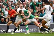 19 August 2023; Garry Ringrose of Ireland on his way to scoring his side's second try despite the tackle of Freddie Steward of England during the Bank of Ireland Nations Series match between Ireland and England at the Aviva Stadium in Dublin. Photo by Harry Murphy/Sportsfile