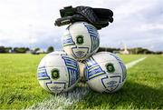 19 August 2023; Goalkeeper gloves are seen resting on a football before the SSE Airtricity Women's Premier Division match between Peamount United and Bohemians at PRL Park in Greenogue, Dublin. Photo by Stephen Marken/Sportsfile