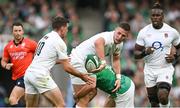 19 August 2023; Freddie Steward of England offloads to teammate George Ford while being tackled by Hugo Keenan of Ireland during the Bank of Ireland Nations Series match between Ireland and England at Aviva Stadium in Dublin. Photo by Brendan Moran/Sportsfile