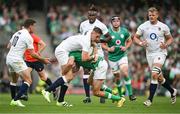 19 August 2023; Freddie Steward of England is tackled by Hugo Keenan of Ireland during the Bank of Ireland Nations Series match between Ireland and England at Aviva Stadium in Dublin. Photo by Brendan Moran/Sportsfile