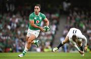 19 August 2023; James Lowe of Irelandevades the tackle of Elliot Daly of England during the Bank of Ireland Nations Series match between Ireland and England at the Aviva Stadium in Dublin. Photo by Harry Murphy/Sportsfile