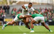 19 August 2023; Anthony Watson of England is tackled by James Lowe, left, and Bundee Aki of Ireland during the Bank of Ireland Nations Series match between Ireland and England at Aviva Stadium in Dublin. Photo by Ramsey Cardy/Sportsfile