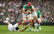19 August 2023; Josh van der Flier of Ireland is tackled by Anthony Watson of England during the Bank of Ireland Nations Series match between Ireland and England at Aviva Stadium in Dublin. Photo by Brendan Moran/Sportsfile