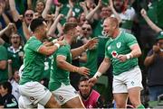19 August 2023; Keith Earls of Ireland celebrates with teammates Jack Crowley and Conor Murray after scoring his side's fifth try during the Bank of Ireland Nations Series match between Ireland and England at the Aviva Stadium in Dublin. Photo by Harry Murphy/Sportsfile