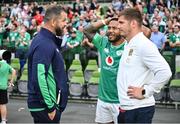19 August 2023; Ireland head coach Andy Farrell in conversation with England players Manu Tuilagi, centre, and Owen Farrell after the Bank of Ireland Nations Series match between Ireland and England at Aviva Stadium in Dublin. Photo by Ramsey Cardy/Sportsfile