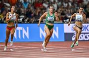 19 August 2023; Kate O'Connor of Ireland, centre, and Esther Turpin of France compete in the 200m of the women's heptathlon during day one of the World Athletics Championships at the National Athletics Centre in Budapest, Hungary. Photo by Sam Barnes/Sportsfile