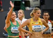 19 August 2023; Kate O'Connor of Ireland, left, after competing in the 200m of the women's heptathlon during day one of the World Athletics Championships at the National Athletics Centre in Budapest, Hungary. Photo by Sam Barnes/Sportsfile